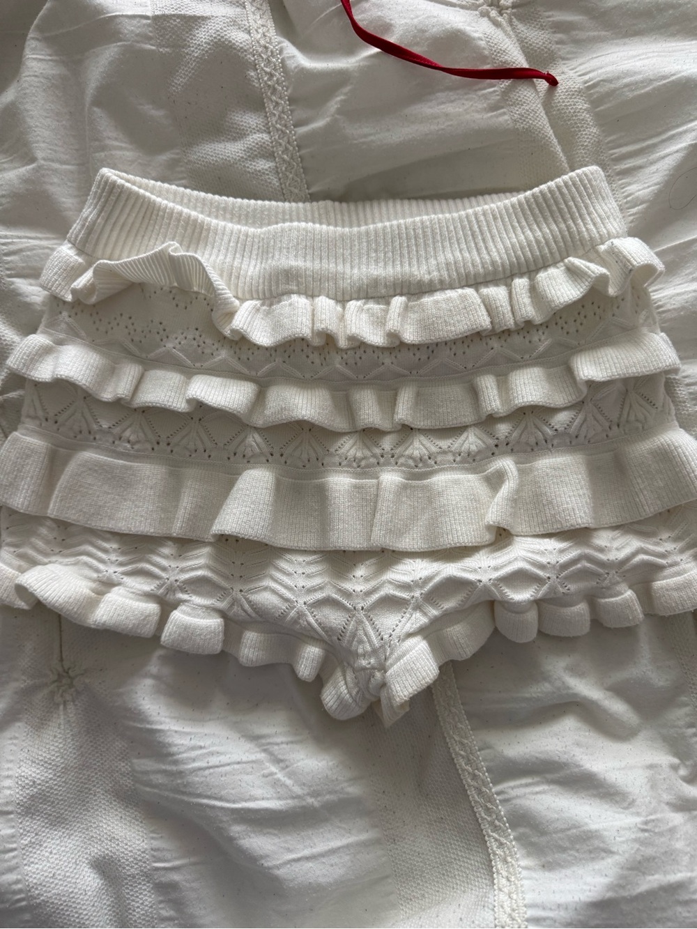 Edikted White Ruffle Knit Shorts